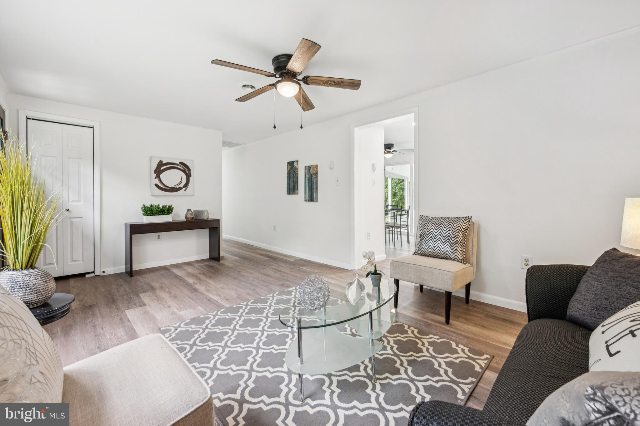 651 Erial Road Sicklerville, NJ 08081 - Photo 6 of 24 a living room with furniture and wooden floor