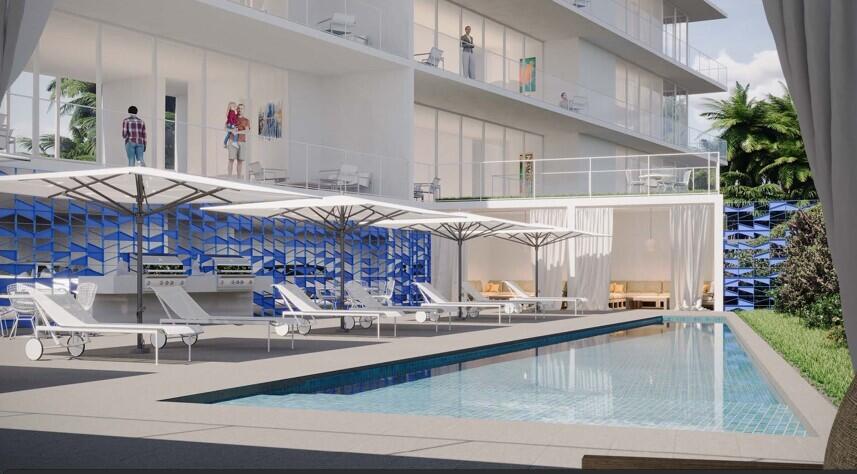 0 North Federal Highway Delray Beach, FL 33483 - Photo 2 of 2 a view of a living room with furniture and a potted plant