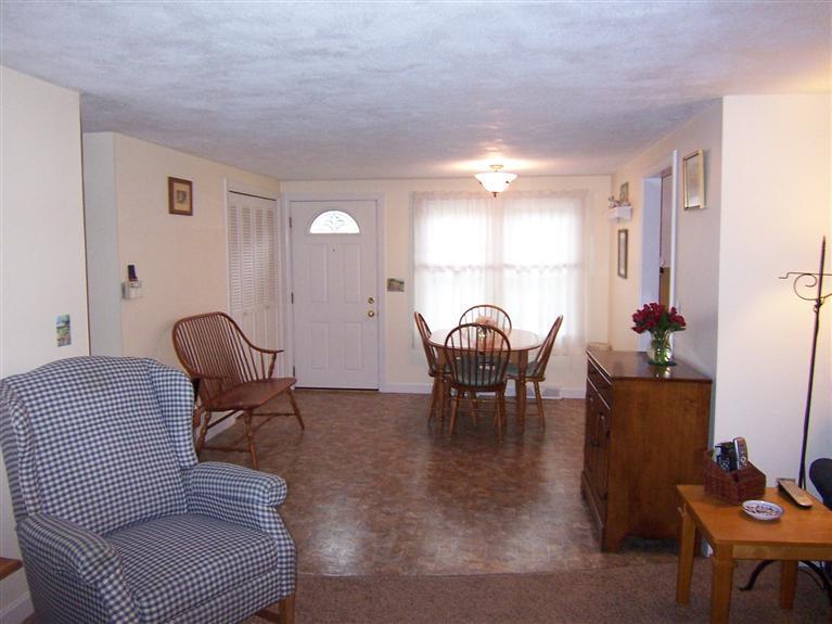 96 Sheaffer Road Centerville, MA 02632 - Photo 15 of 33 a living room with furniture and wooden floor