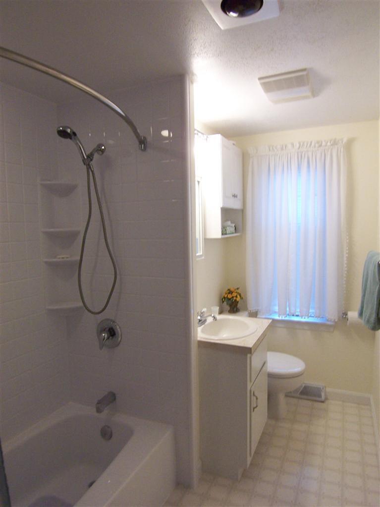 96 Sheaffer Road Centerville, MA 02632 - Photo 27 of 33 a bathroom with a sink toilet and shower