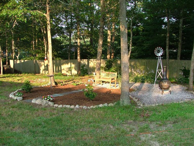 96 Sheaffer Road Centerville, MA 02632 - Photo 7 of 33 a view of a park with large trees