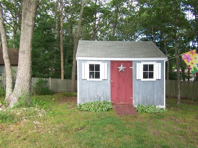96 Sheaffer Road Centerville, MA 02632 - Photo 8 of 33 front view of house with a yard