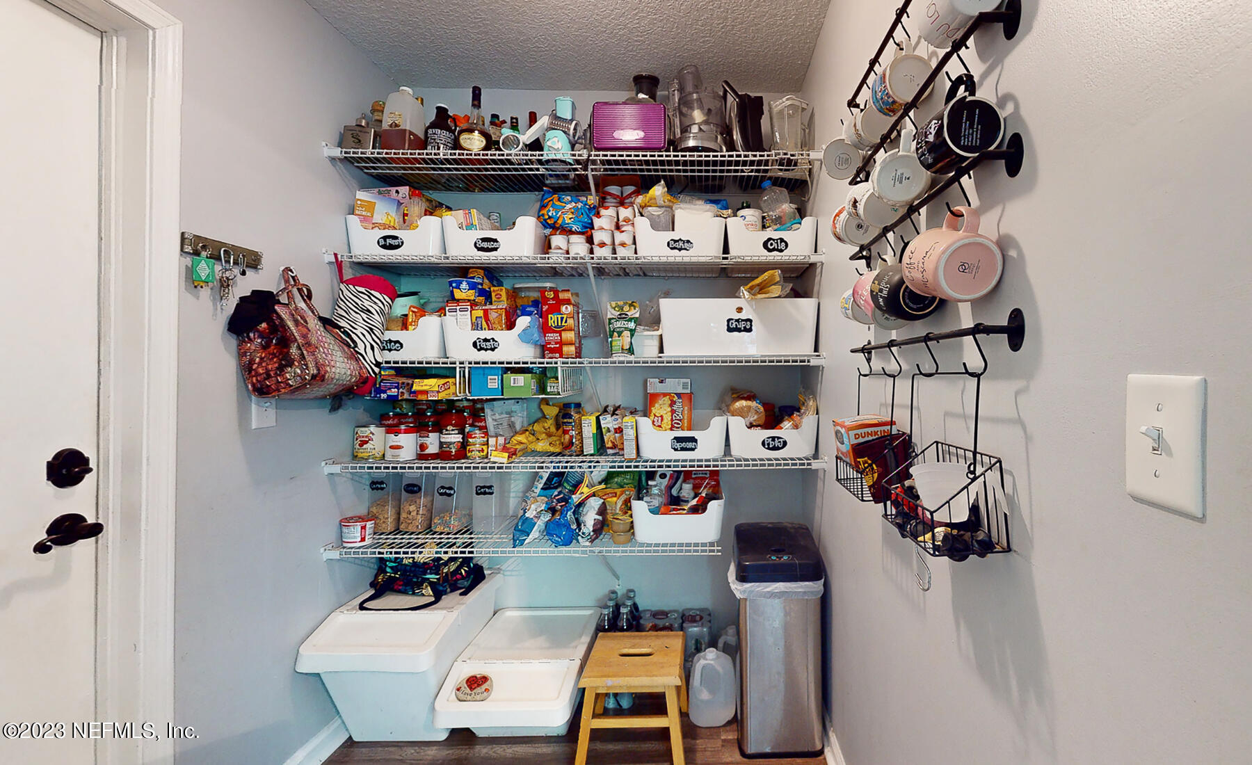 11338 Rustic Pines Circle East Jacksonville, FL 32257 - Photo 16 of 33 a room with storage and utility racks