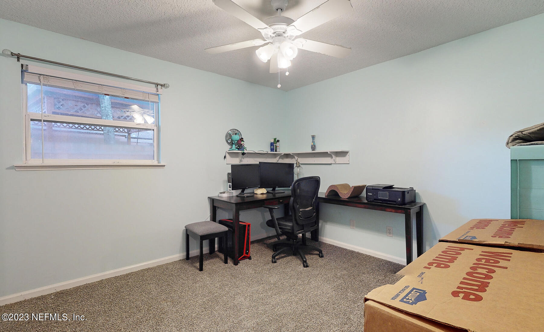 11338 Rustic Pines Circle East Jacksonville, FL 32257 - Photo 21 of 33 a view of a workspace with furniture