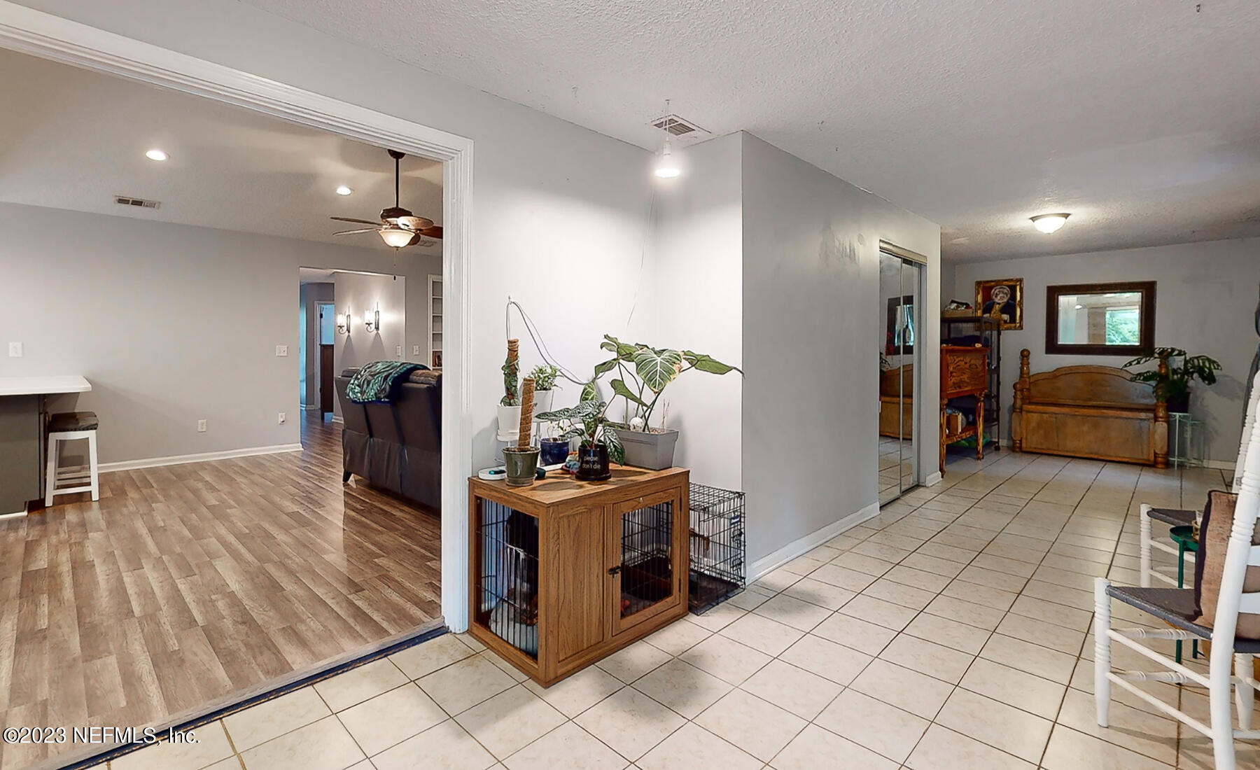 11338 Rustic Pines Circle East Jacksonville, FL 32257 - Photo 27 of 33 a view of a kitchen with kitchen island a counter top space a stove and wooden floor