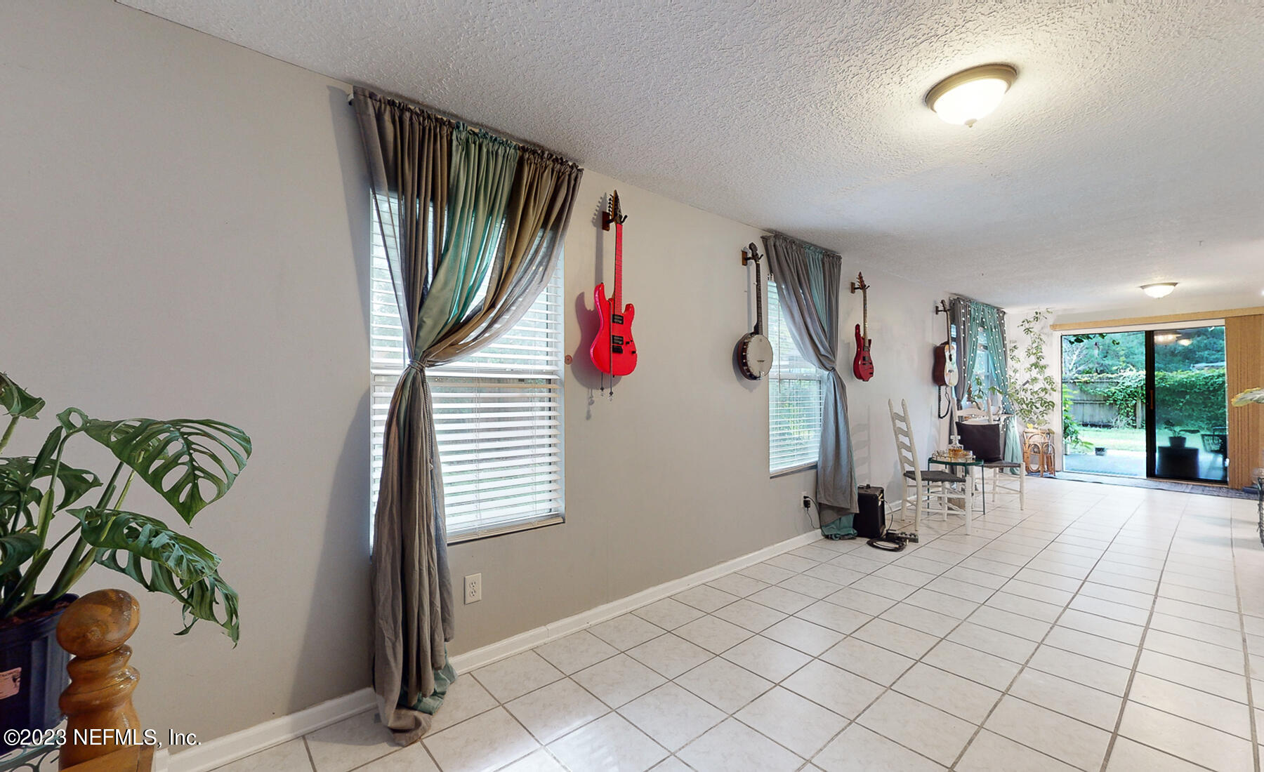 11338 Rustic Pines Circle East Jacksonville, FL 32257 - Photo 3 of 33 a view of hallway with furniture and a window
