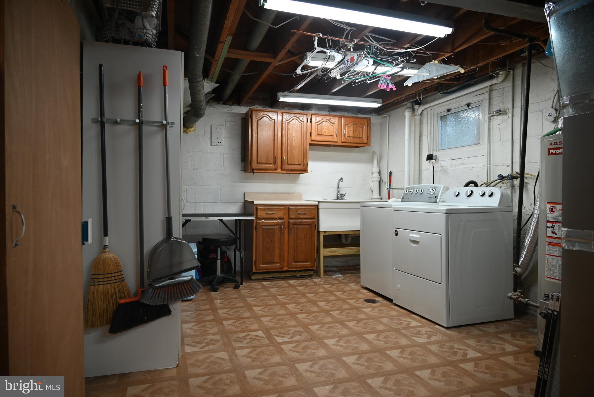 406 Belton Road Silver Spring, MD 20901 - Photo 22 of 36 Large laundry/storage area