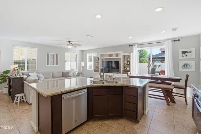a kitchen with kitchen island granite countertop lots of counter top space