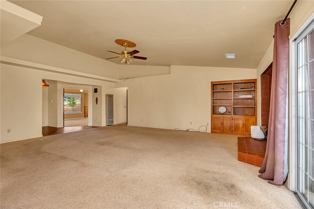 5030 Creek Front Road Catheys Valley, CA 95306 - Photo 18 of 69 a view of an empty room with a window