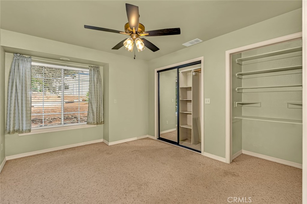 5030 Creek Front Road Catheys Valley, CA 95306 - Photo 25 of 69 a view of an empty room with a window