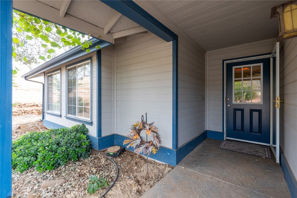 5030 Creek Front Road Catheys Valley, CA 95306 - Photo 4 of 69 a backyard of a house with lots of green space