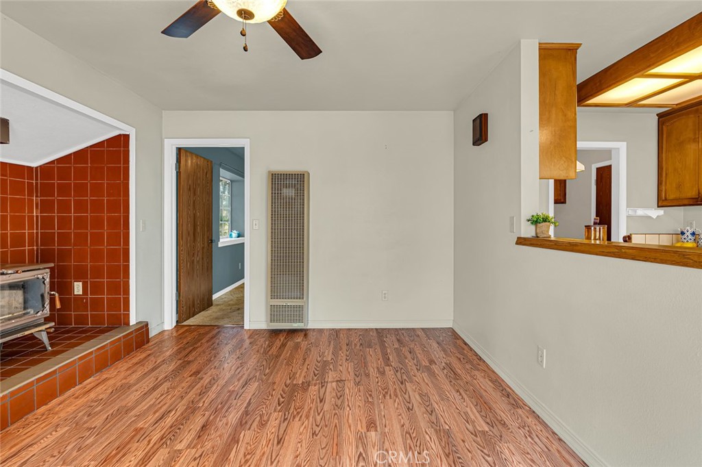 5030 Creek Front Road Catheys Valley, CA 95306 - Photo 54 of 69 wooden floor in an empty room