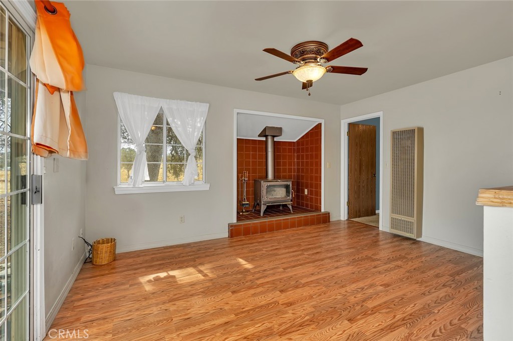 5030 Creek Front Road Catheys Valley, CA 95306 - Photo 55 of 69 a view of a livingroom with a ceiling fan and window