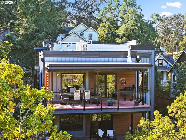 front view of a house with a balcony