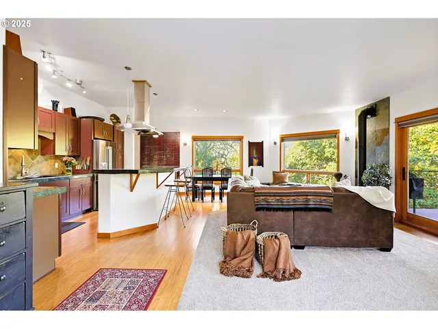 a lobby with furniture and floor to ceiling window