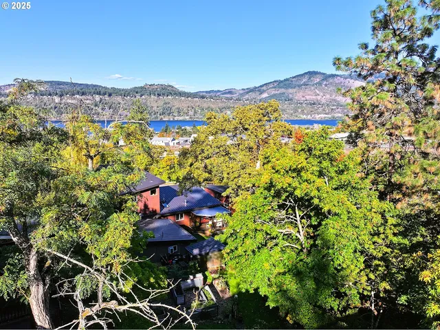a outdoor dining space with furniture and garden view