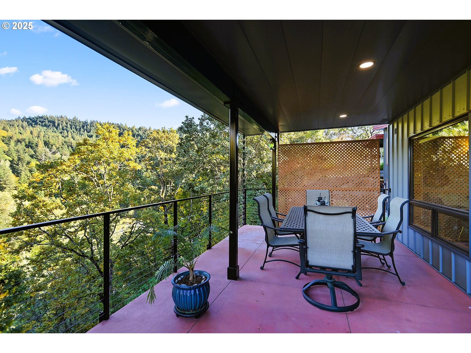 515 East 4th Street, Unit 2 Hood River, OR 97031 - Photo 22 of 48 a view of a chairs and table in patio