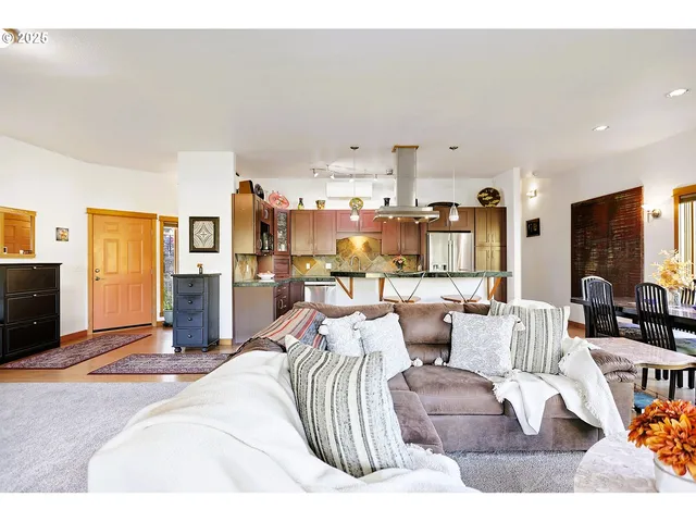 a kitchen with stainless steel appliances granite countertop a sink and cabinets