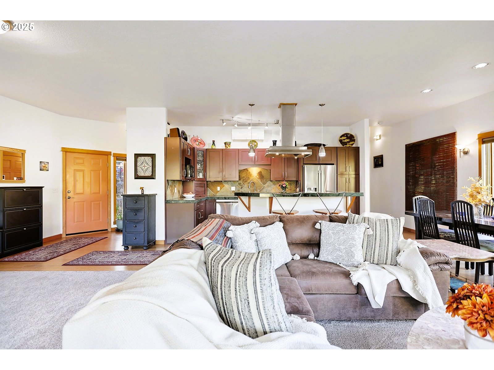 515 East 4th Street, Unit 2 Hood River, OR 97031 - Photo 25 of 48 a living room with furniture and a flat screen tv