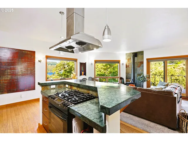 a view of a kitchen with a sink