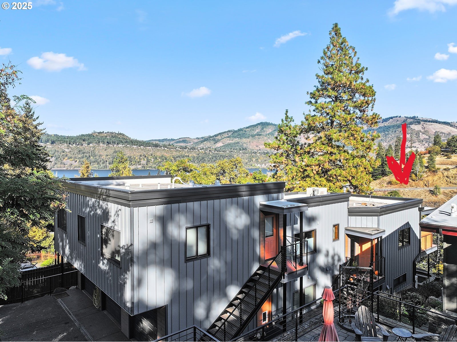 515 East 4th Street, Unit 2 Hood River, OR 97031 - Photo 8 of 48 a terrace with outdoor seating and city view