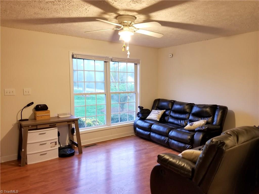 832 Raintree Court Randleman, NC 27317 - Photo 2 of 16 Spacious LR with Laminate Flooring