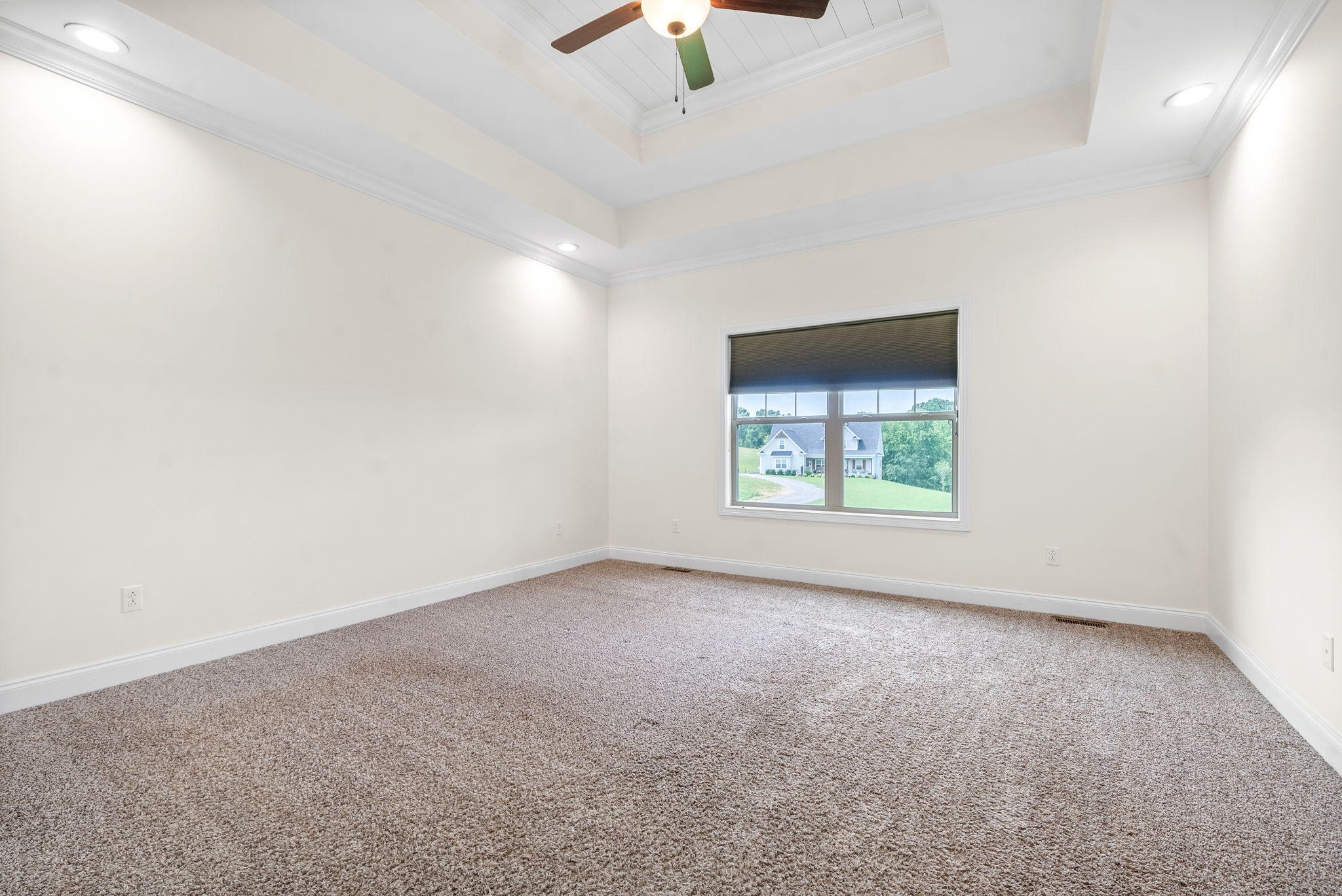 1452 Hickory Point Road Clarksville, TN 37043 - Photo 19 of 38 an empty room with a window and a ceiling fan