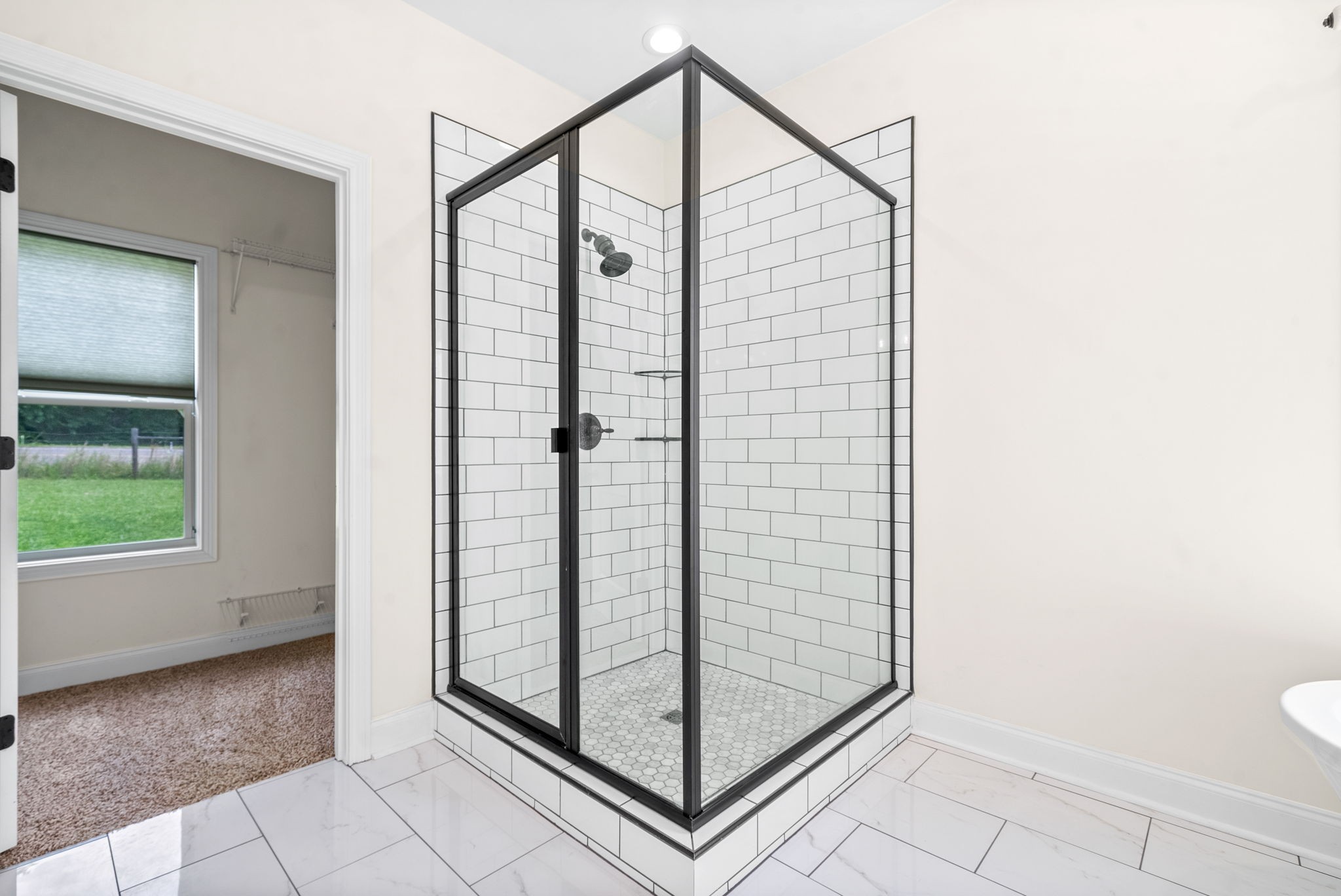 1452 Hickory Point Road Clarksville, TN 37043 - Photo 24 of 38 a view of a bathroom with a glass door