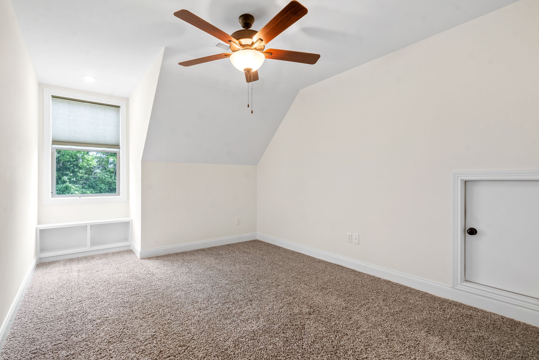 1452 Hickory Point Road Clarksville, TN 37043 - Photo 27 of 38 an empty room with a window and a fan