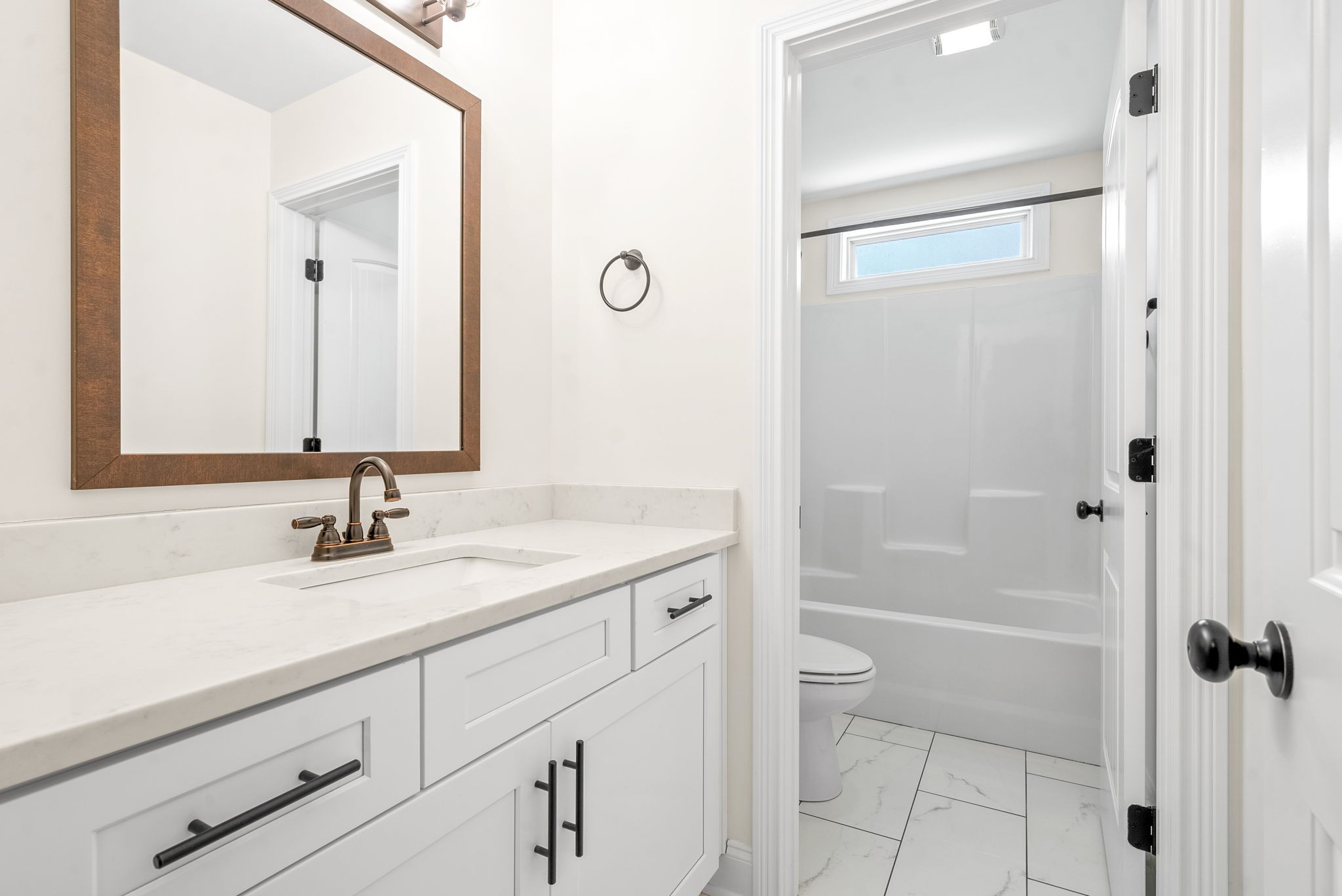 1452 Hickory Point Road Clarksville, TN 37043 - Photo 28 of 38 a bathroom with a sink a toilet and shower