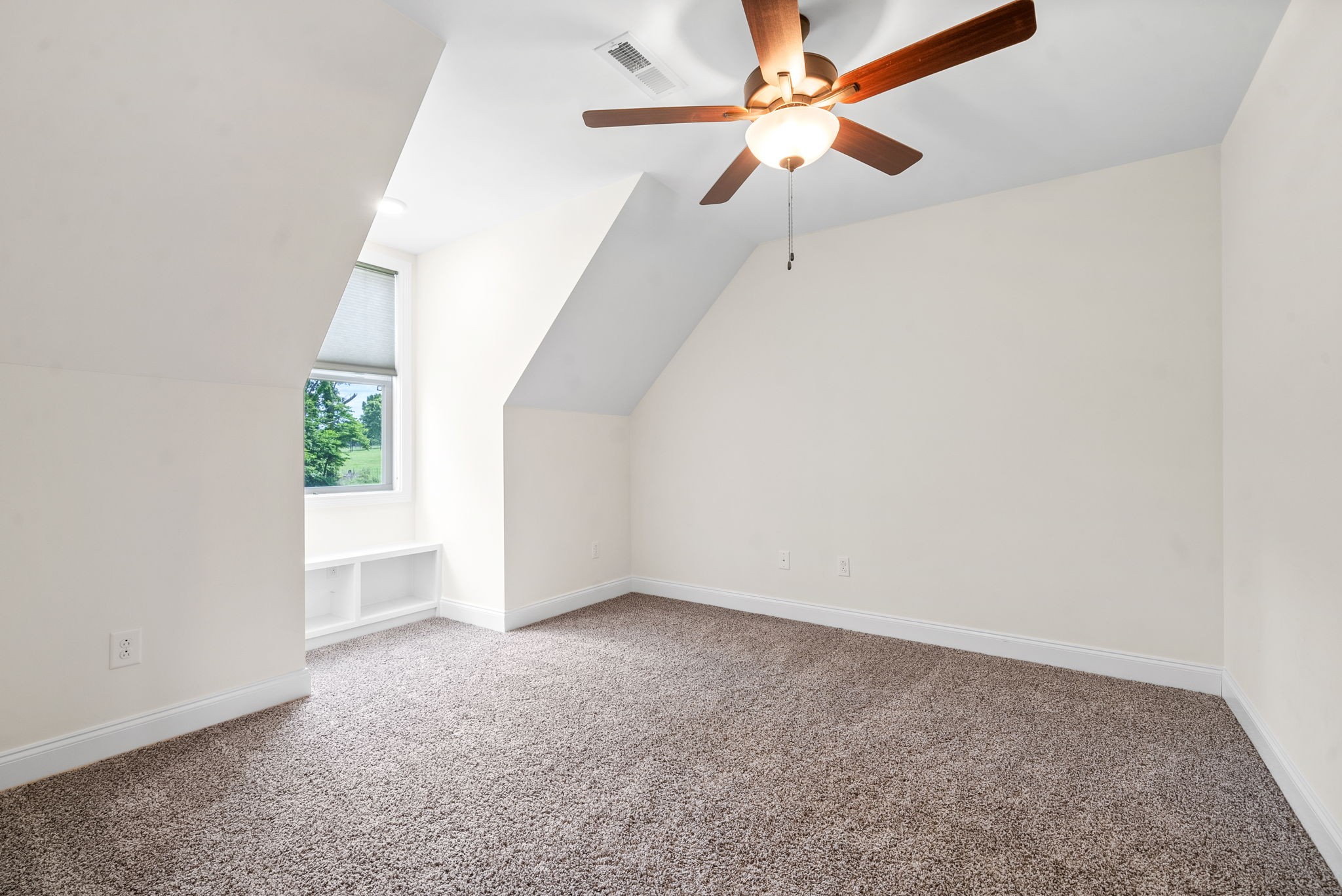1452 Hickory Point Road Clarksville, TN 37043 - Photo 29 of 38 an empty room with windows and fan