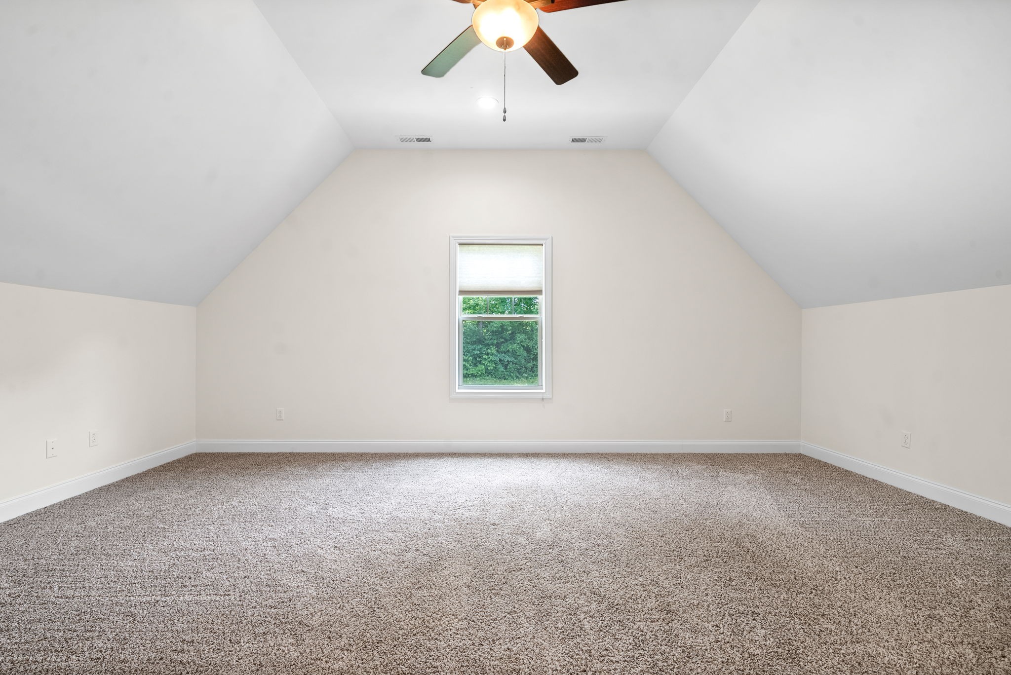 1452 Hickory Point Road Clarksville, TN 37043 - Photo 30 of 38 an empty room with a window and a ceiling fan