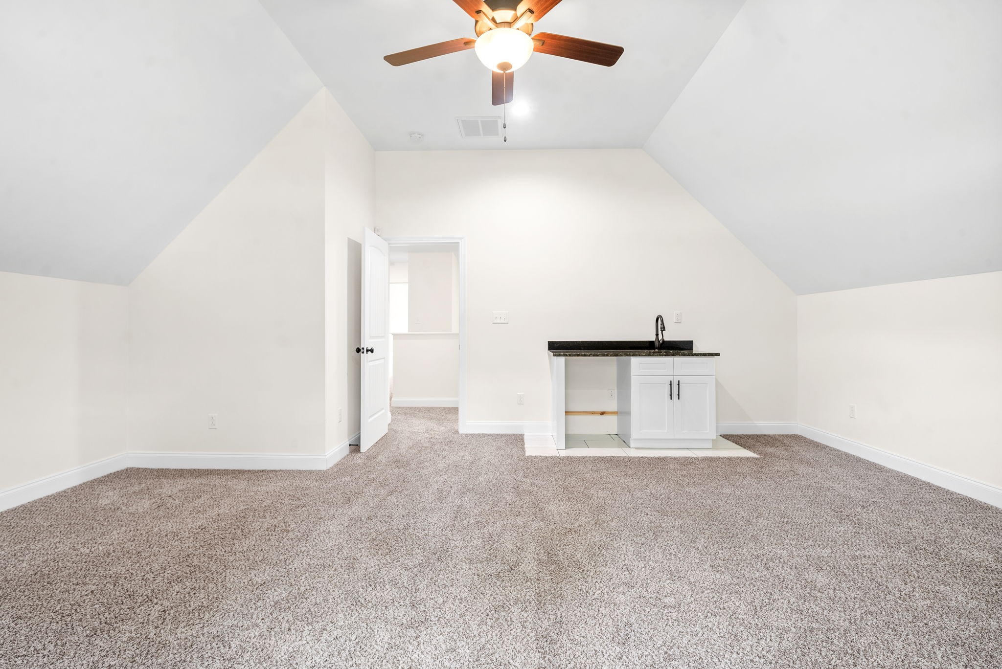 1452 Hickory Point Road Clarksville, TN 37043 - Photo 31 of 38 an empty room with windows and ceiling fan