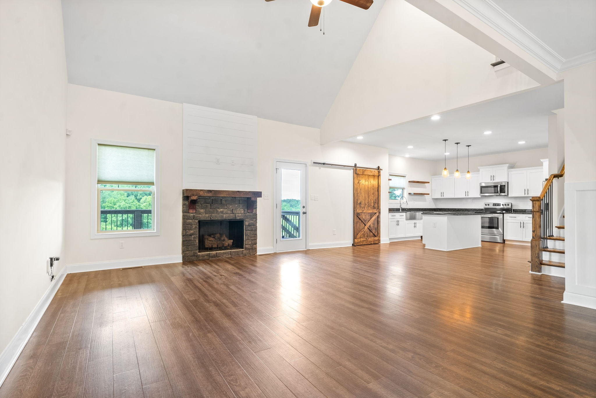 1452 Hickory Point Road Clarksville, TN 37043 - Photo 6 of 38 a view of kitchen and hall with wooden floor