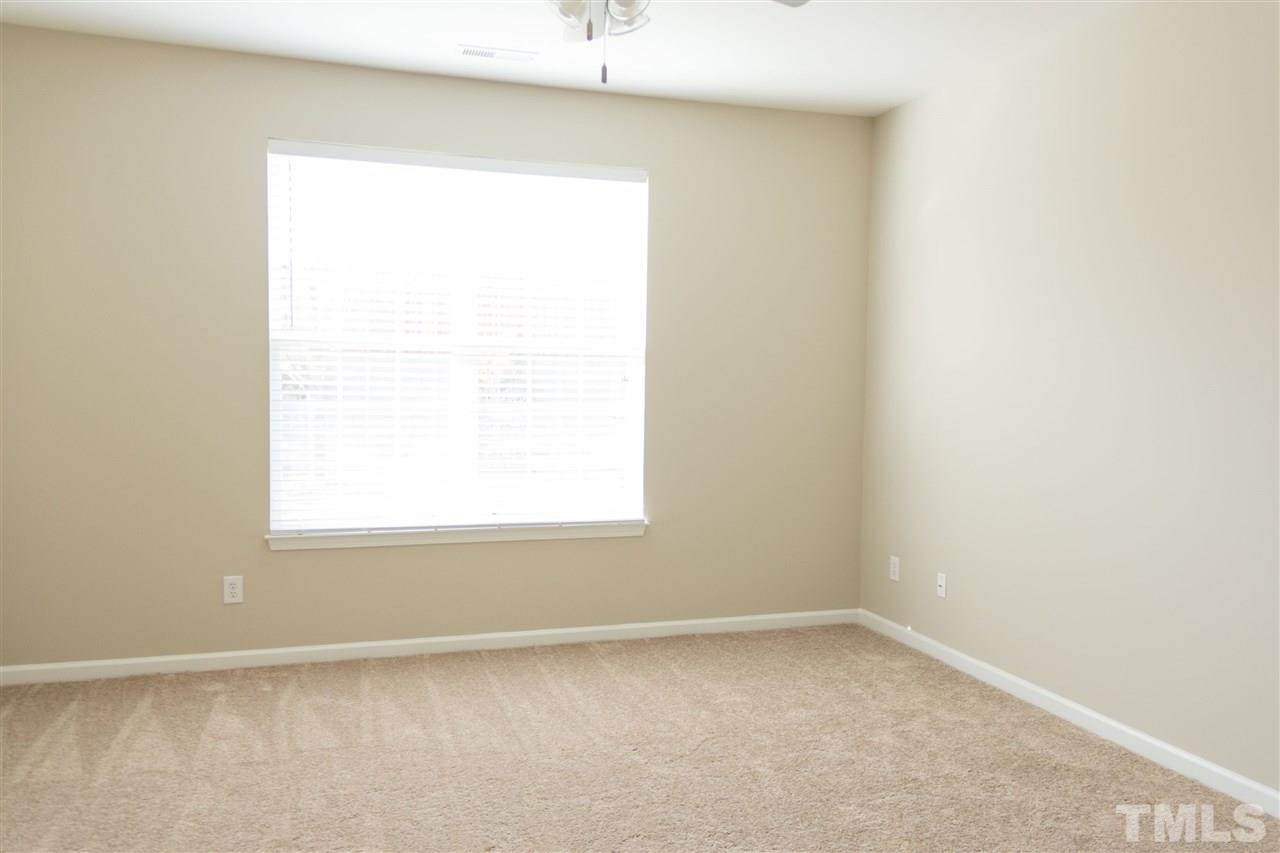 203 Hope Valley Road Knightdale, NC 27545 - Photo 12 of 25 an empty room with a window