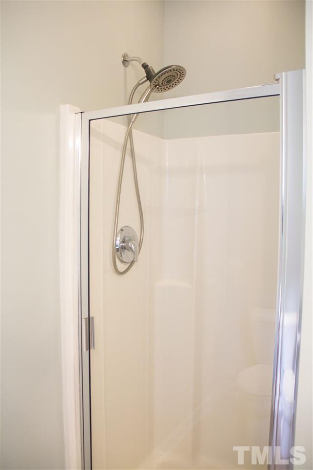 203 Hope Valley Road Knightdale, NC 27545 - Photo 15 of 25 a bathroom with a shower