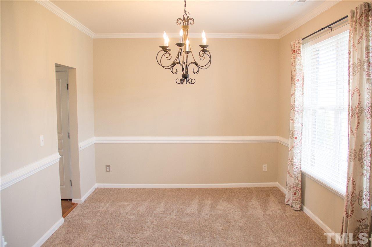 203 Hope Valley Road Knightdale, NC 27545 - Photo 3 of 25 a view of an empty room with a window