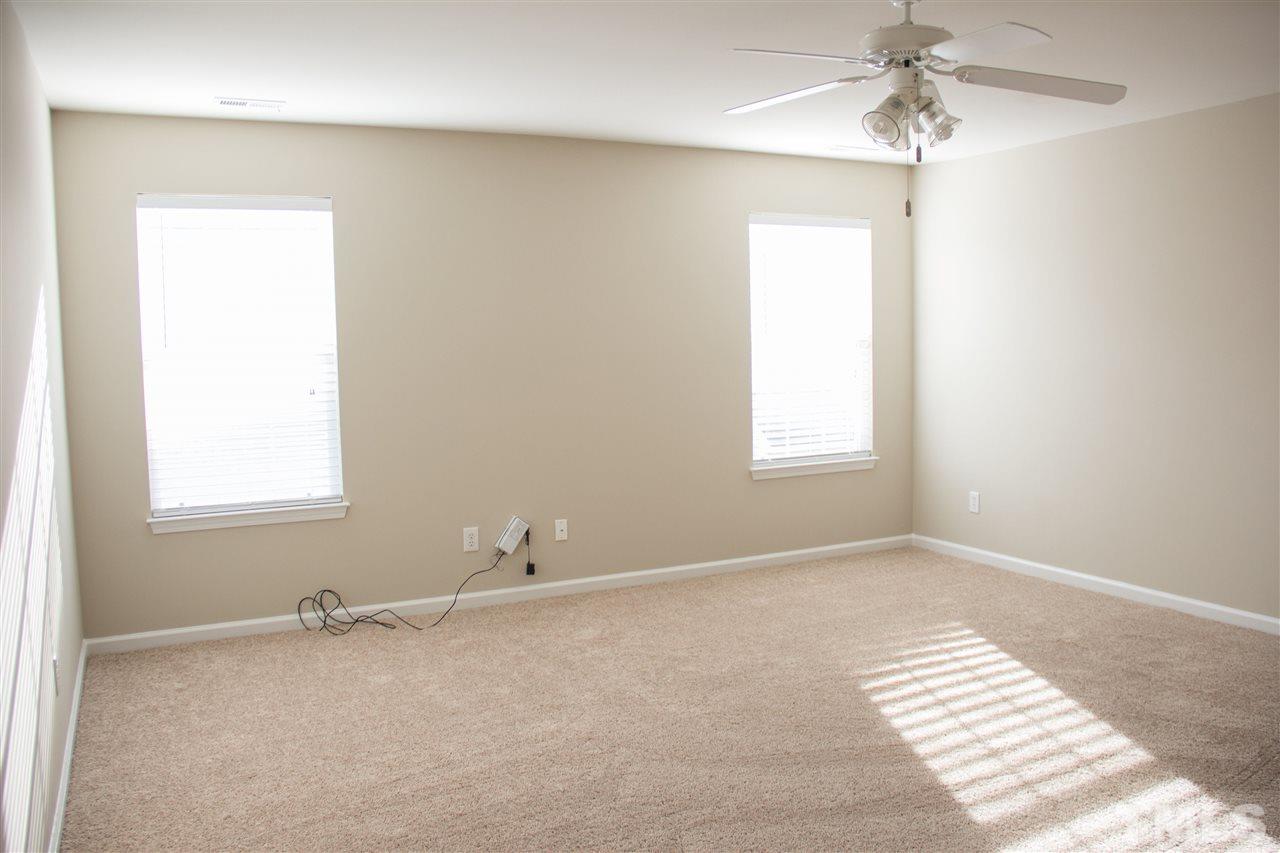 203 Hope Valley Road Knightdale, NC 27545 - Photo 21 of 25 a view of an empty room with a window