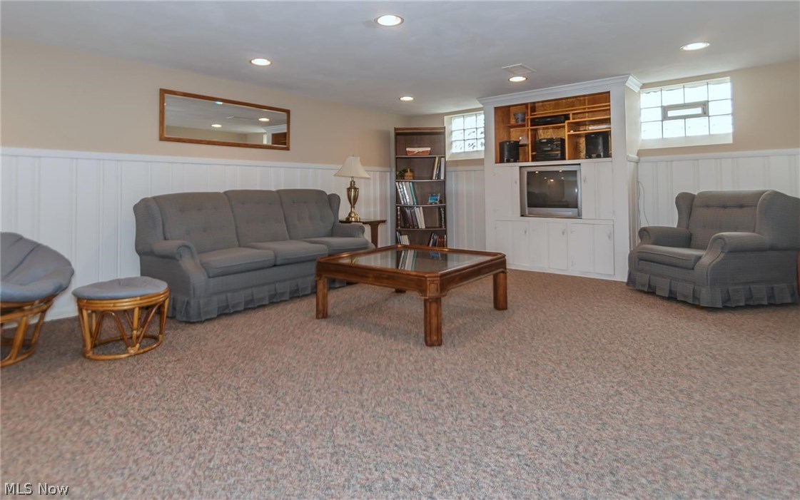 1143 Brainard Road Lyndhurst, OH 44124 - Photo 10 of 35 Family room with built ins, gas fireplace and plenty of storage.