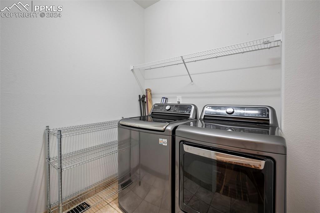 8238 Hollygrape Lane Colorado Springs, CO 80927 - Photo 18 of 35 a view of washer and dryer