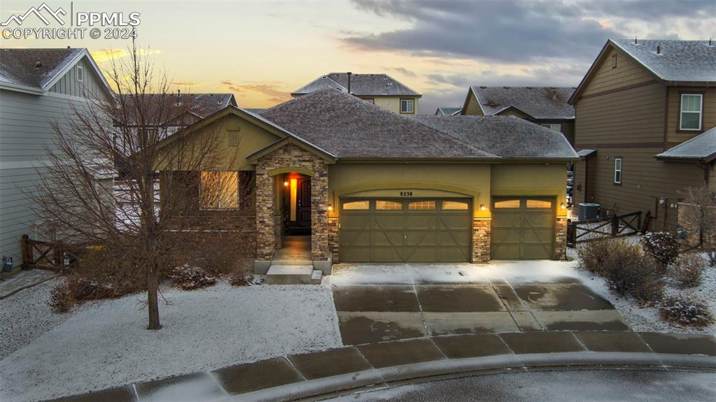 8238 Hollygrape Lane Colorado Springs, CO 80927 - Photo 34 of 35 a front view of a house with garden