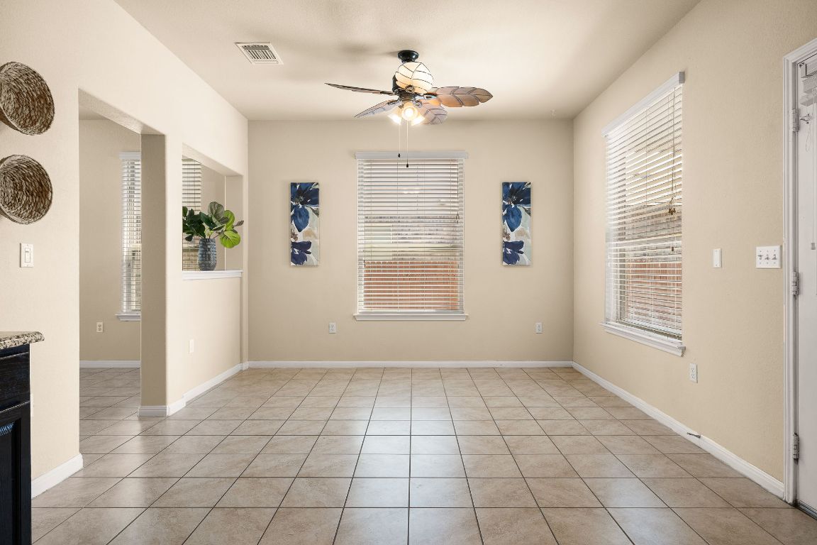 1432 Blake Street Leander, TX 78641 - Photo 11 of 26 a view of an empty room with a window