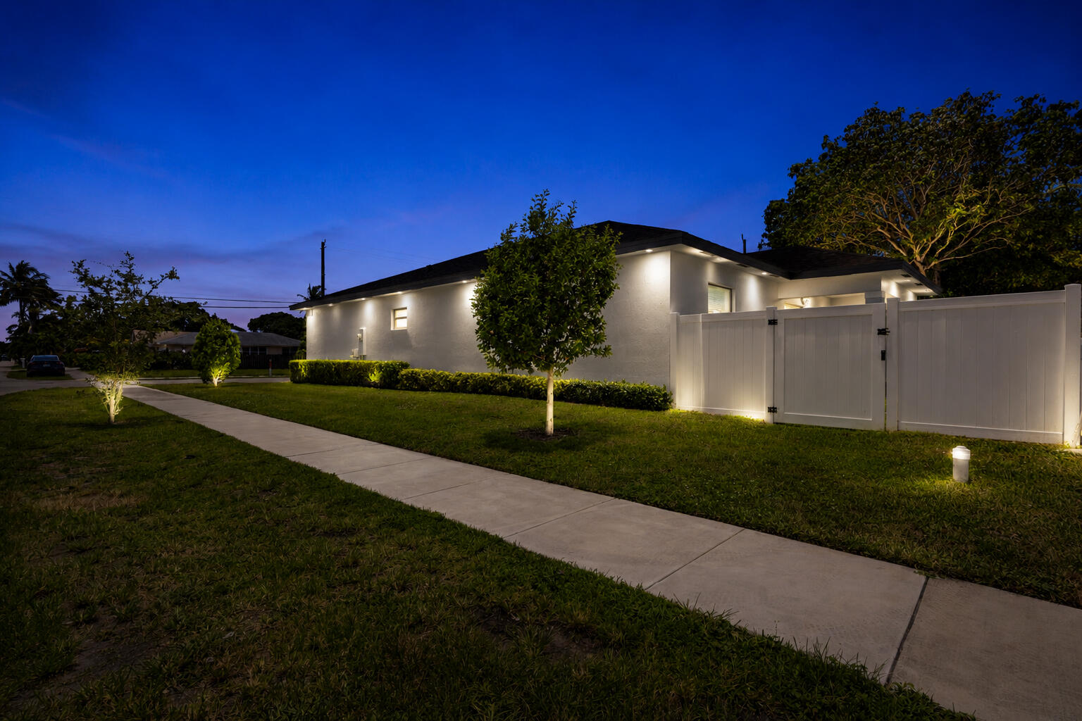 601 Southwest 3rd Street Delray Beach, FL 33444 - Photo 54 of 75 a view of a big yard with potted plants