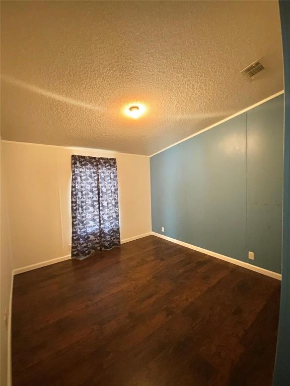 11255 Sam Reynolds Road Justin, TX 76247 - Photo 12 of 19 a view of an empty room with a window