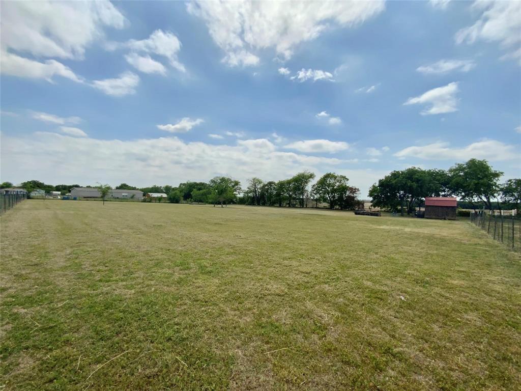 11255 Sam Reynolds Road Justin, TX 76247 - Photo 18 of 19 a view of lake with outdoor space