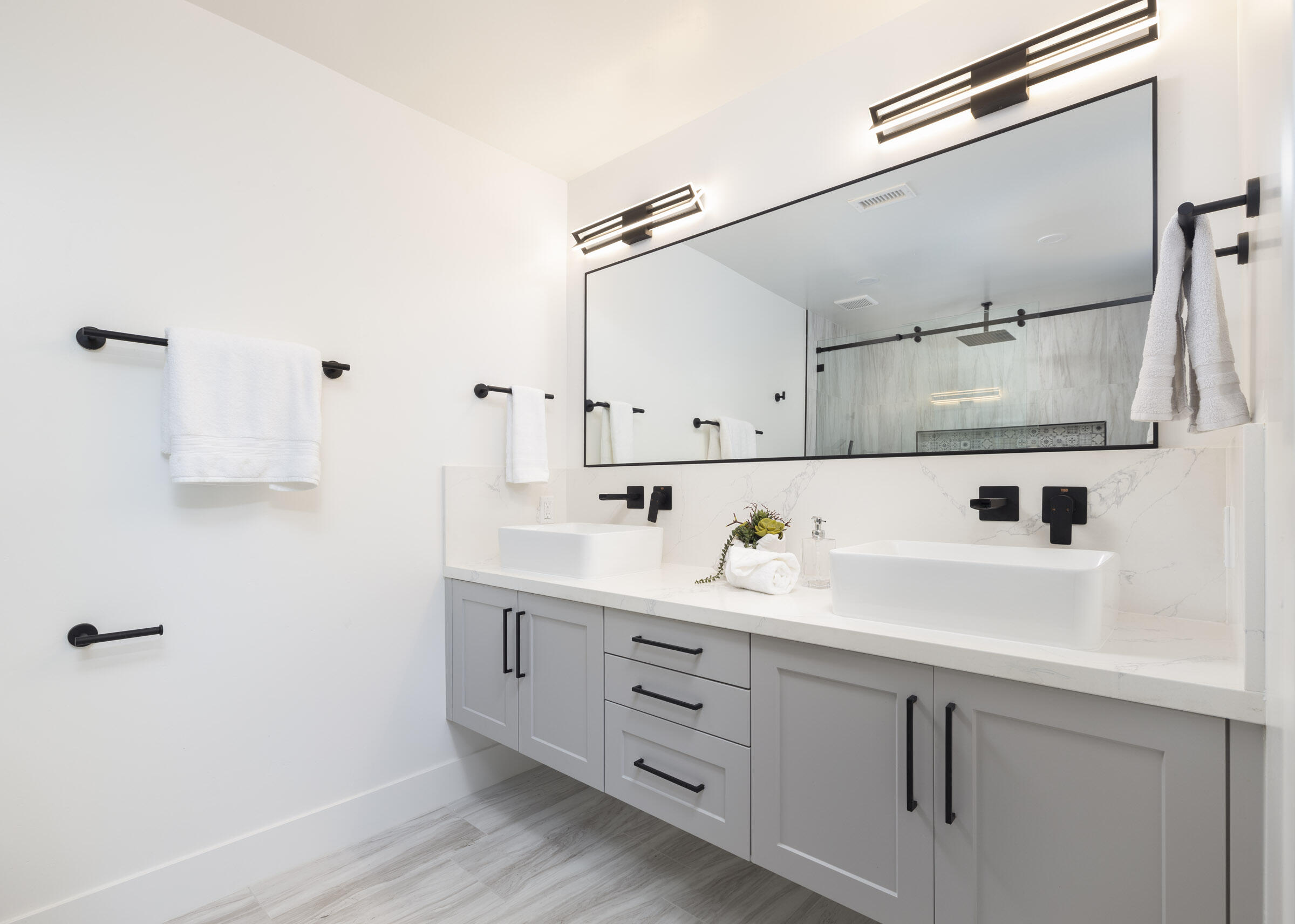 373 Northgate Drive, Unit A Goleta, CA 93117 - Photo 20 of 37 a utility room with cabinets washer and dryer