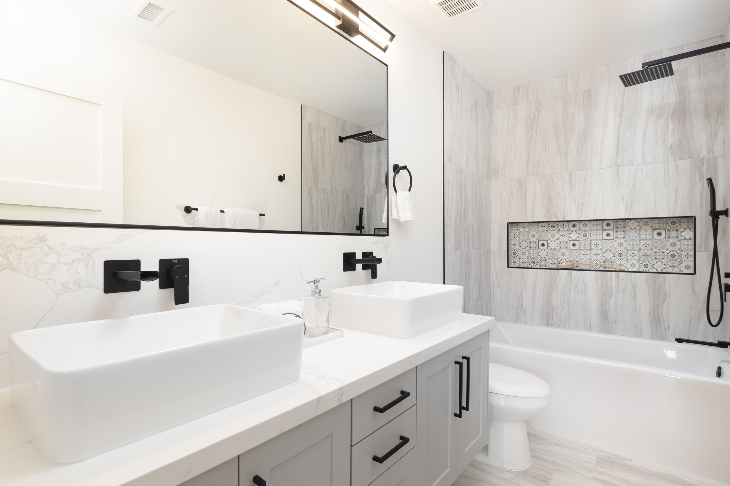 373 Northgate Drive, Unit A Goleta, CA 93117 - Photo 27 of 37 a bathroom with a sink a toilet and bathtub