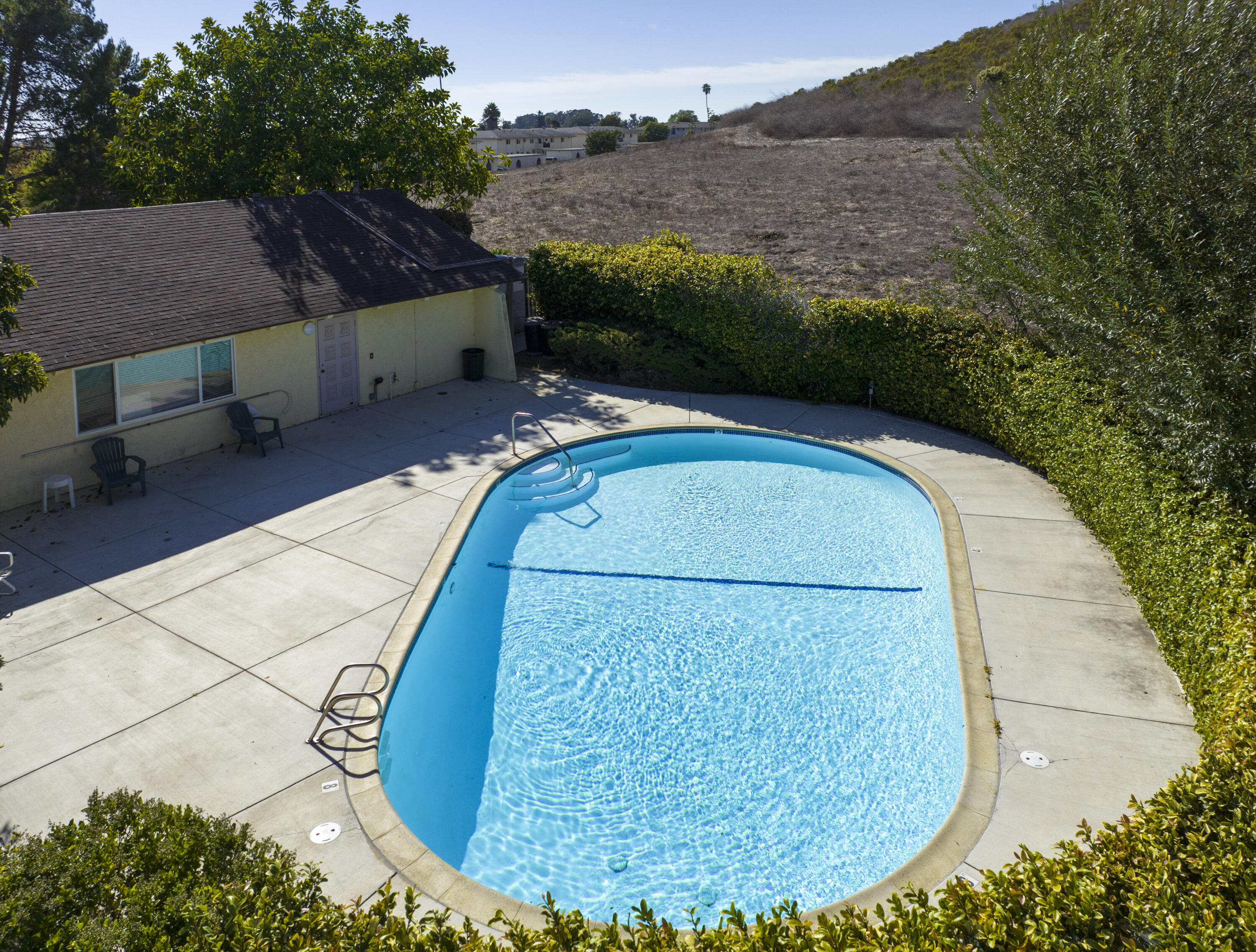 373 Northgate Drive, Unit A Goleta, CA 93117 - Photo 35 of 37 a view of a swimming pool with a yard