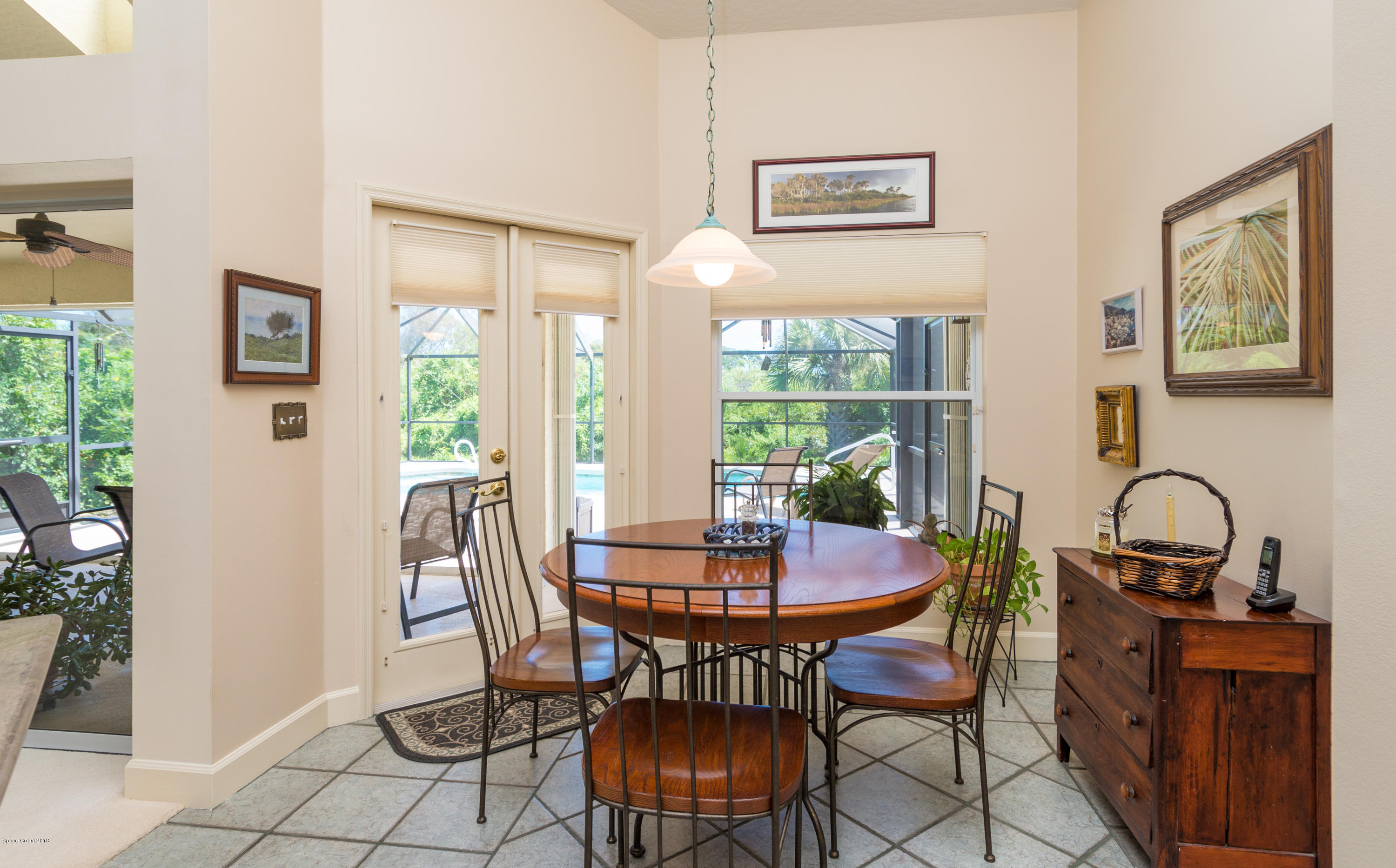 3535 Shady Run Road Melbourne, FL 32934 - Photo 11 of 30 a dining room with furniture and window