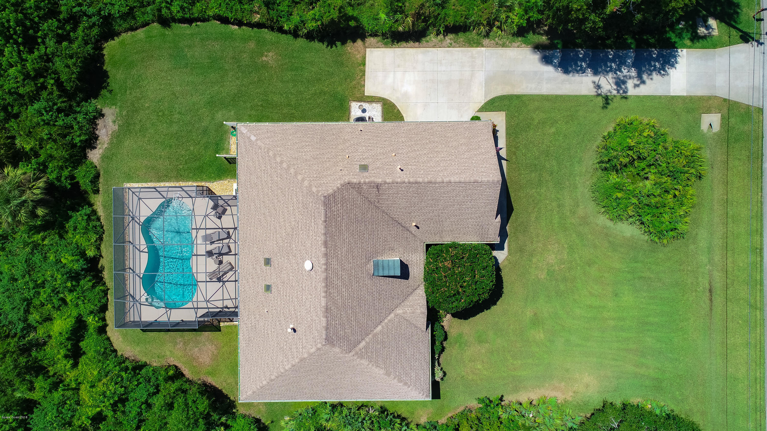 3535 Shady Run Road Melbourne, FL 32934 - Photo 24 of 30 an aerial view of a house with a garden